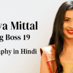 तान्या मित्तल बिग बॉस 19 बायोग्राफी पोस्टर जिसमें पारंपरिक परिधान में एक महिला दिखाई दे रही है।